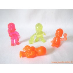 "Les Babies" lot de 4 figurines translucides à paillettes