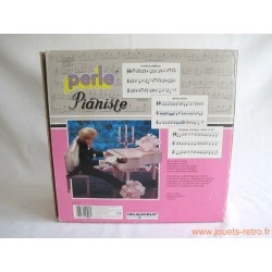 Poupée Perle pianiste